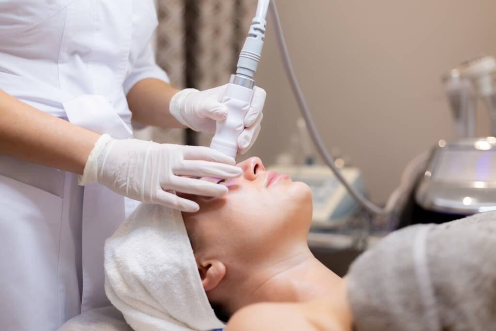 Dermatologist performing HydraFacial at CFH Skin & Hair Clinic in Chennai, giving a patient smooth, glowing, and hydrated skin with results lasting weeks.